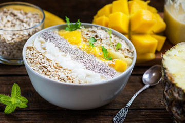 Mango, Banana, Pineapple and Oatmeal Smoothie in the Bowl