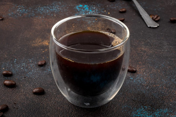 black coffee in a double-bottomed glass