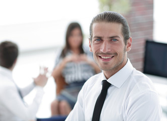 successful young business men on blurred background