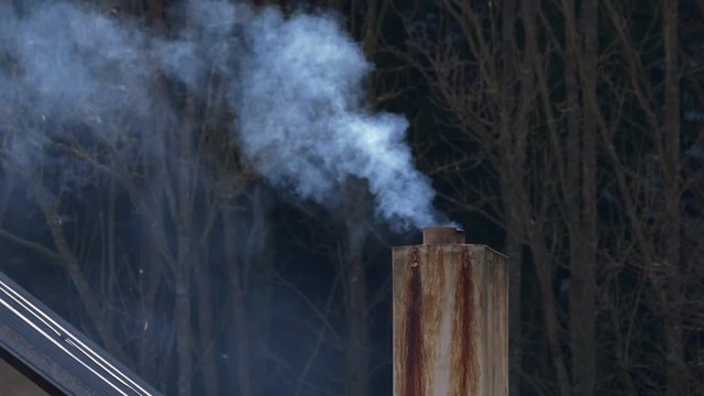 Smoke rising from old chimney