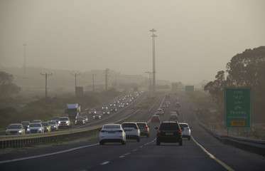Traffic during Massive Middle East sand storm in Israel Highway 2