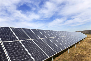 Solar Power Station on the early spring Meadow 