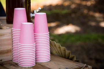 Pink cups for wedding reception refreshments