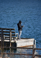 Man Fishing on Lake