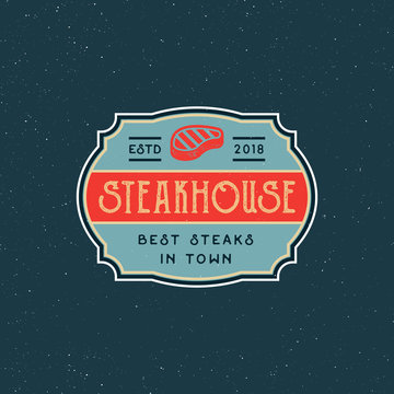 vintage steak house logo. retro styled grill restaurant emblem. vector illustration