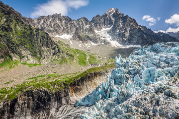 View on Argentiere glacier. Hiking to Argentiere glacier with the view on the massif des Aiguilles Rouges in French Alps