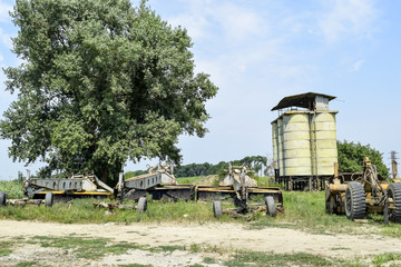 Grader on a trailer for heavy equipment.
