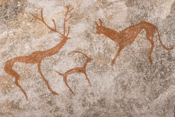 An image of ancient animals on the wall of the cave. stone Age. history. archeology.