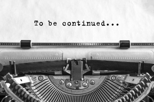 To be continued... typed words on a old Vintage Typewriter. Close-up.