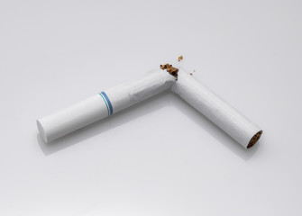 broken cigarette breaks the addiction to cancer causing tobacco products and habits