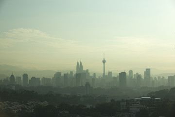 Fototapeta na wymiar kuala lumpur morning skyline view with fog