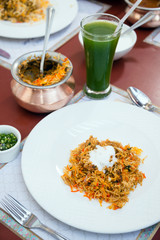 Tikka Biryani with basmati rice and chapati bread