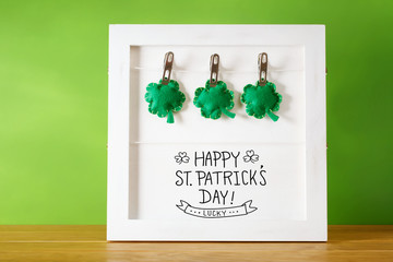 Saint Patricks Day message board with clover cushions