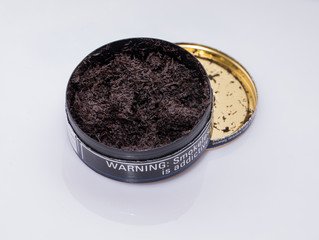 open can of smokeless tobacco is ready for use
