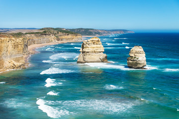Two of Twelve Apostels with blue ocean and cloudless sky at the Great Ocean Road, Victoria,...