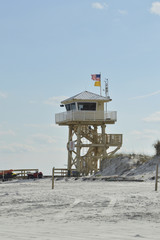 The lifeguard tower on the Beach over looking the ocean for safety