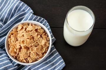 Healthy Corn Flakes with milk for Breakfast on table