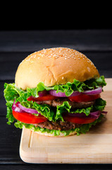 Burger served in bun in nutrition fast food concept