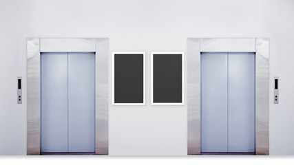 Blank vertical billboard or poster in the elevator hall. 3D illustration of advertising surface.