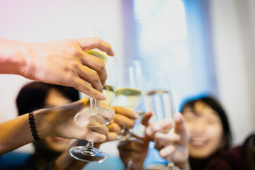 Asian group of friends having party with alcoholic beer drinks and Young people enjoying at a bar toasting cocktails.soft focus