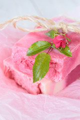 Rose Handmade Soap.Soap with Rose Extract. handmade soap pink with roses on pink crumpled paper. Organic Vegetable Cosmetics .Natural vegan soap with rose fragrance