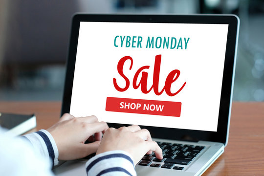 Woman using laptop computer with black friday sale on screen background, holiday shopping online, digital marketing, business and technology, lifestyle concept
