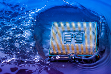 technology cyber electronic concept. cpu ram computer Fall into the water on blue light background....