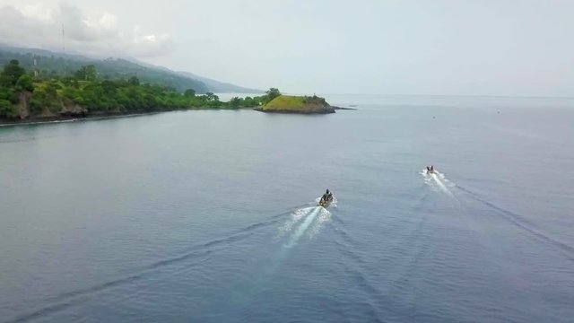 Two motor pirogues on Sao Tome north coast