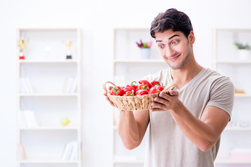 Young man in healthy eating and dieting concept