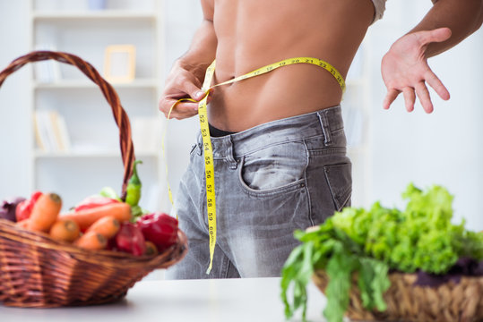 Young man in healthy eating and dieting concept