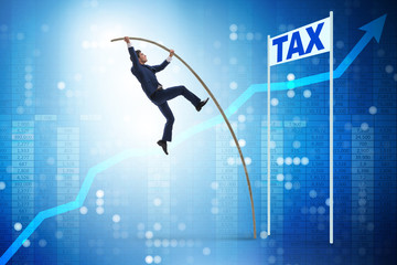 Businessman jumping over tax in tax evasion avoidance concept