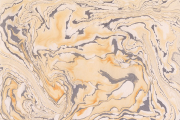 Suminagashi marble texture hand painted with orange ink. Digital paper 398 performed in traditional japanese suminagashi floating ink technique. Classy liquid abstract background.
