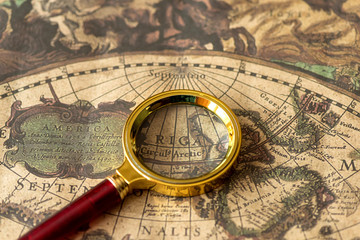 Retro magnifier with old map