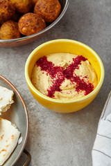 Overhead image of traditional jewish and middle eastern dish hummus. Israeli cuisine concept