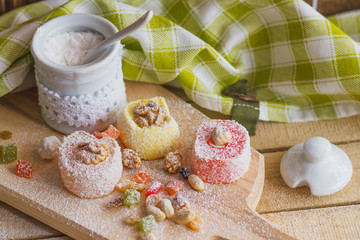 East sweets with fruits, nuts and sugar powder