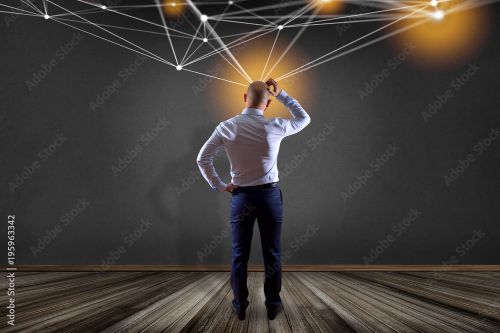 Poster businessman in front of a wall with web operating system screen and network connection displayed on 