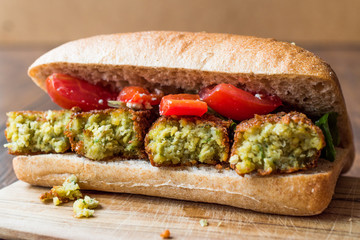 Chickpea Falafel Sandwich with Tomatoes and Sauce