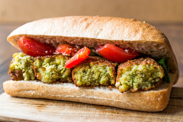 Chickpea Falafel Sandwich with Tomatoes and Sauce