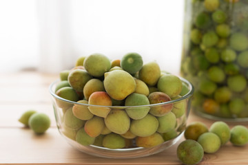Japanese apricot in glass bowl prepare foe make ume plum wine