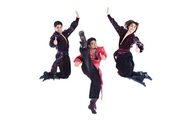 Fototapeta na wymiar Gypsy trio of dancers in traditional dress performs folk dance