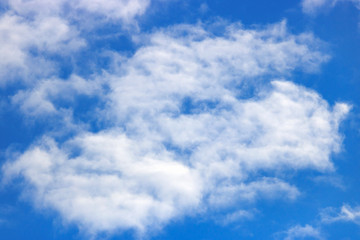 White clouds against blue sky. Sky background
