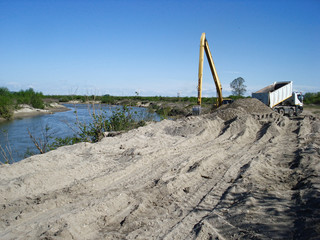 Fototapeta premium Truck unload sand
