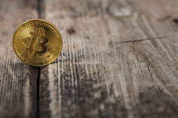 Bitcoin on an old wooden table