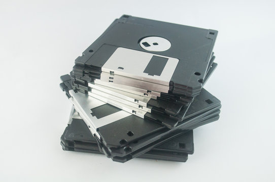 Front of an old magnetic disket on white background
