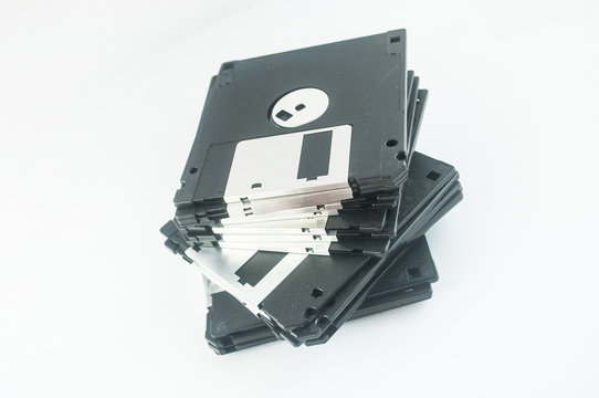 Front of an old magnetic disket on white background
