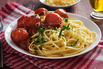 Italian pasta with cherry tomato sauce and parsley