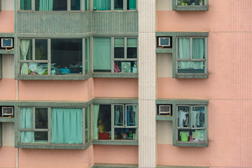 Fototapeta premium Windows of residential house in Hong Kong, China.