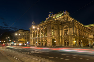 Fototapeta na wymiar Wide shot of traffic passing the Vienna Opera House