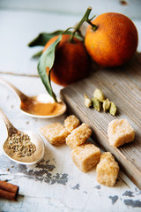 Celebrate new year winter evening with hot drink. Mulled wine or grog ingredients. White background top view. Space for text