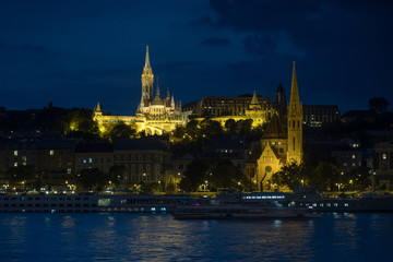 Matthias Church and River Danube lit up at night